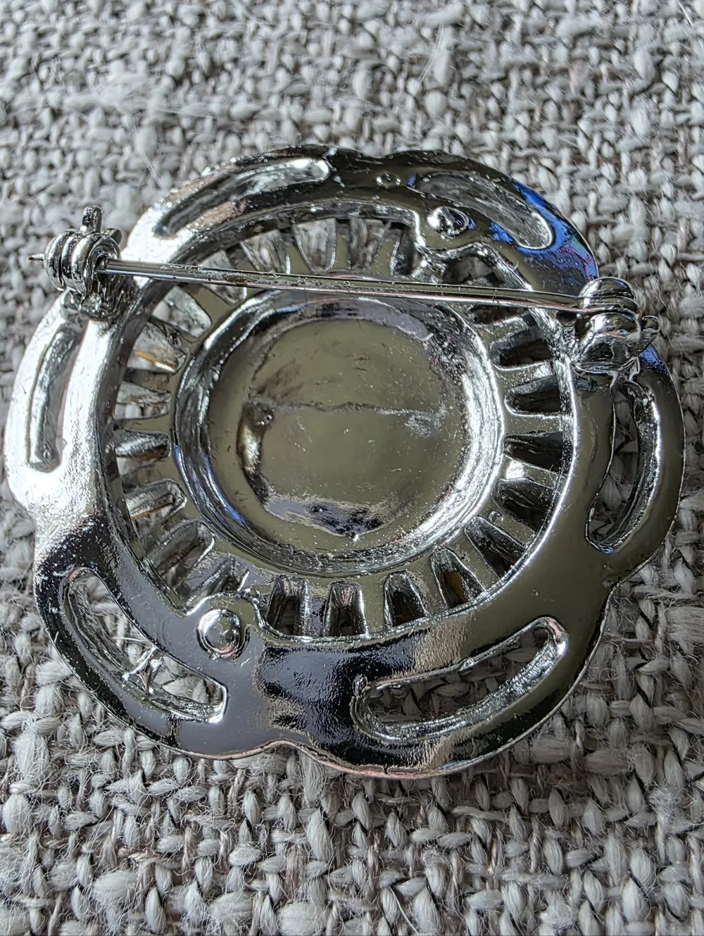 Vintage rhinestone brooch circular, tiered design with clear faceted rhinestones